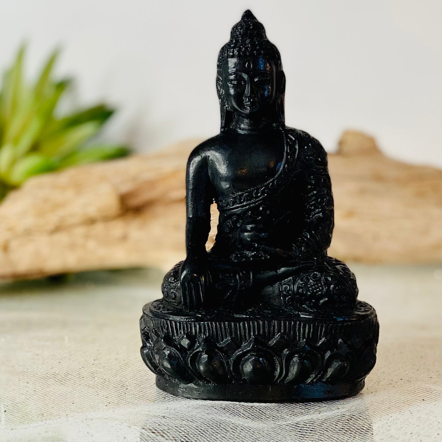 Sacred Serenity: Black Buddha Statue for Your Altar
