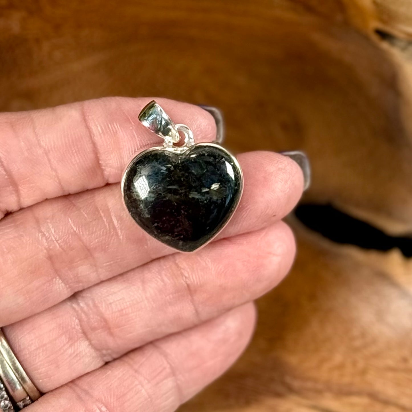 Channel the Earth's Energy with our Nuummite Pendant in Sterling Silver