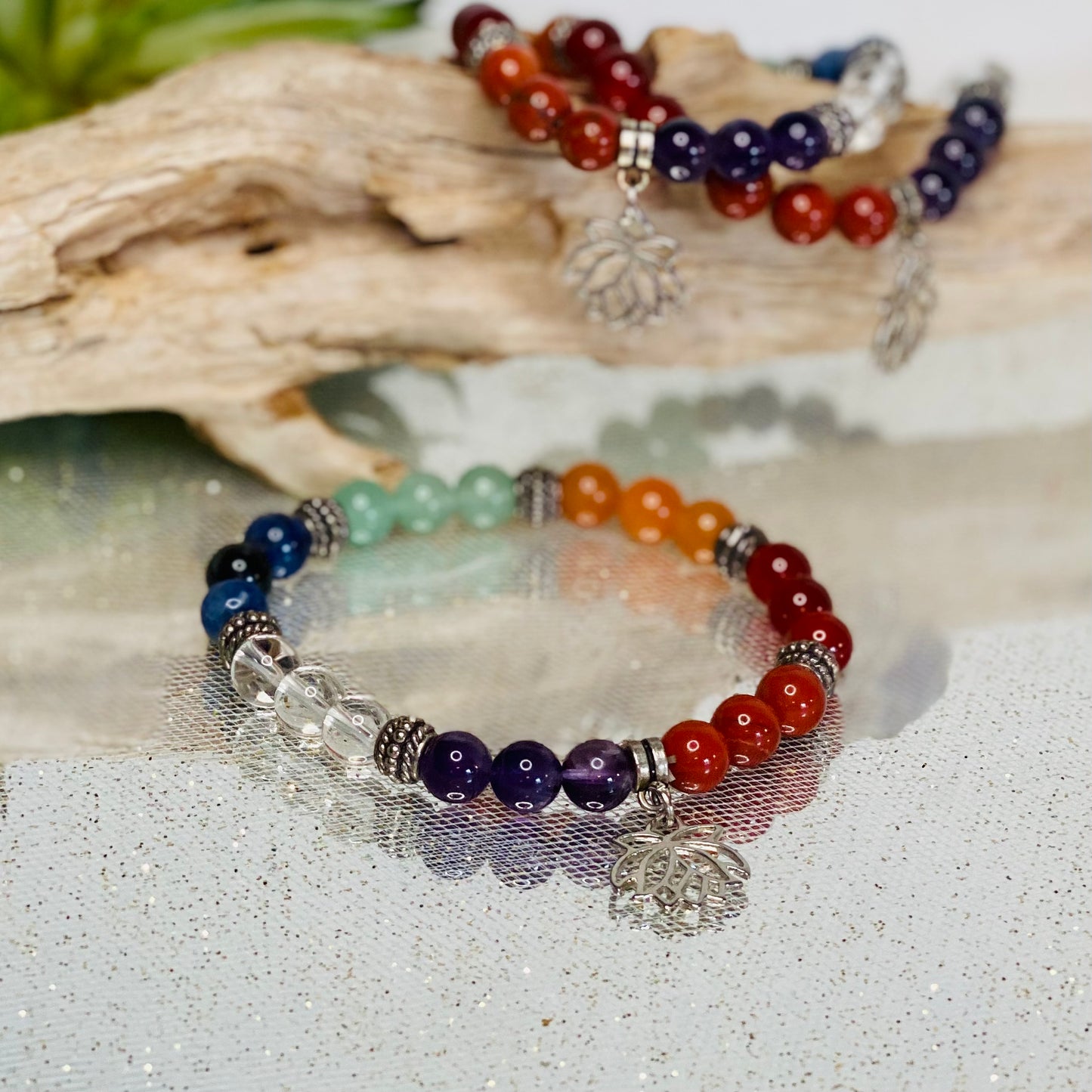 Chakra Balancing Bracelet with Red Jasper, Carnelian, Calcite, Green Aventurine, Blue Howlite, Sodalite, Amethyst, and Lotus Flower Charm