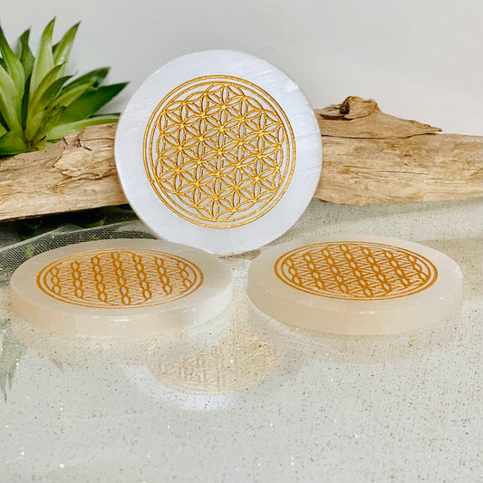 Amplify and Purify Energies with our Flower of Life Gold Engraved Selenite Charging Plates
