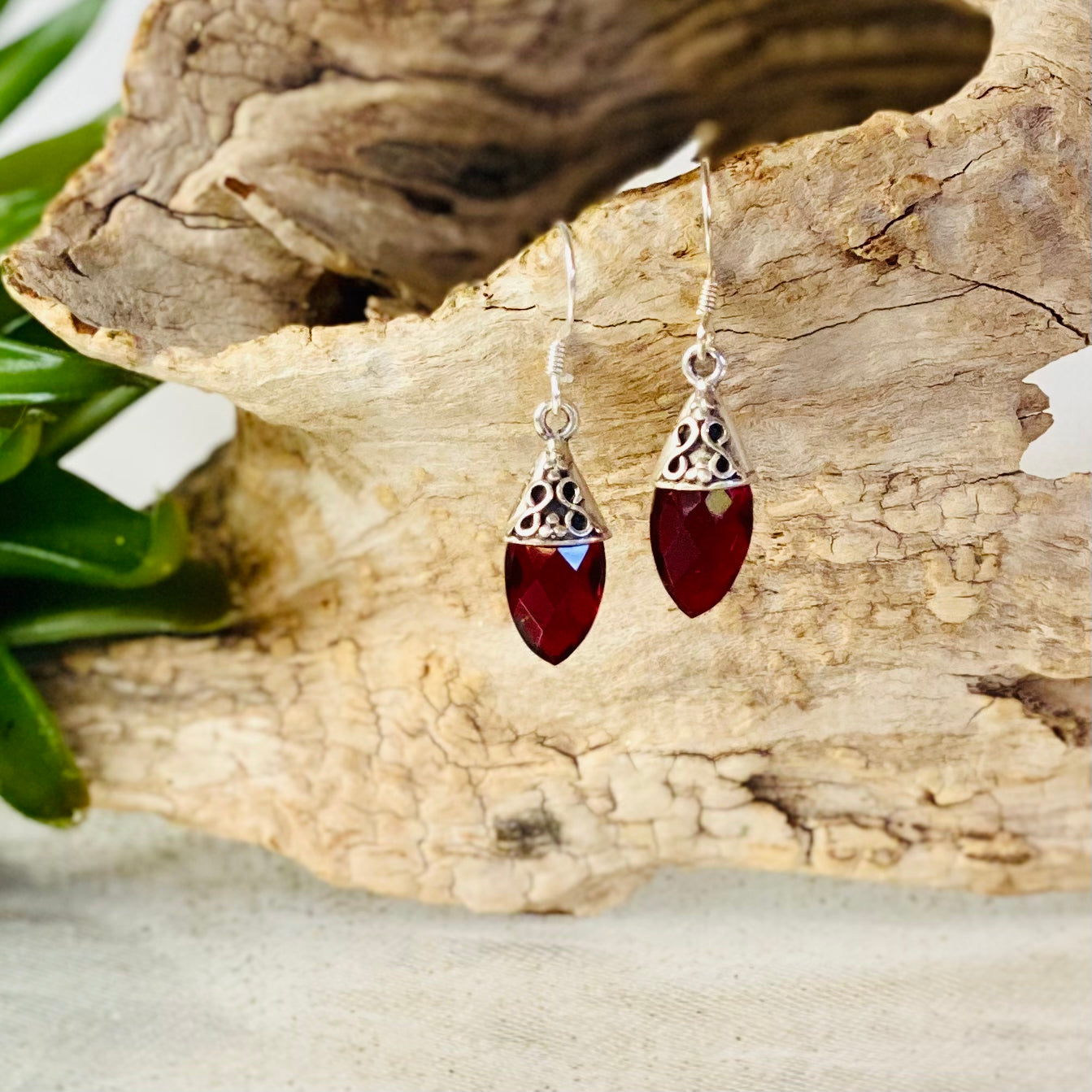 Sterling Silver Faceted Tear Drop Earrings: Elegance in Motion