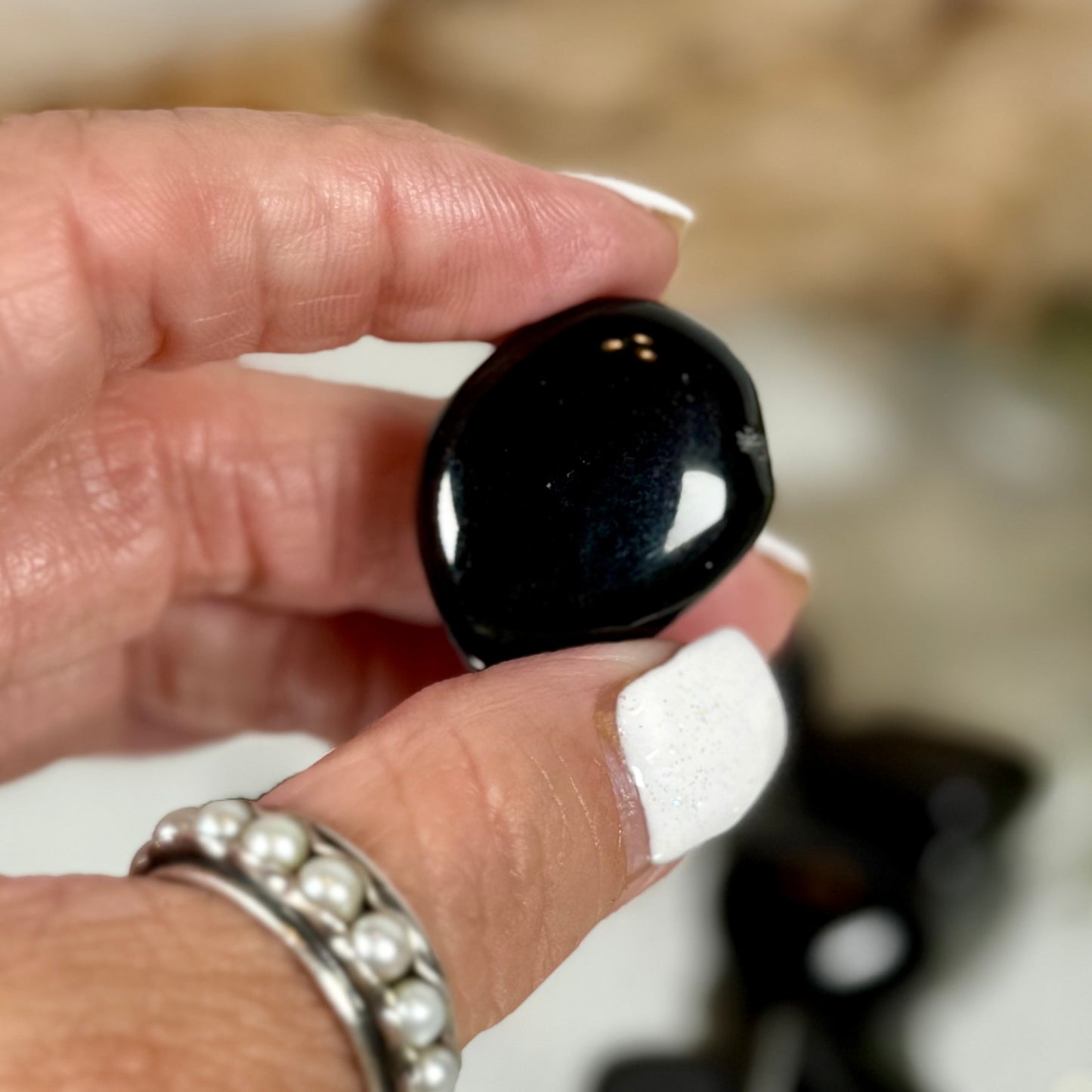 Black Obsidian crystal one in hand-CBTS