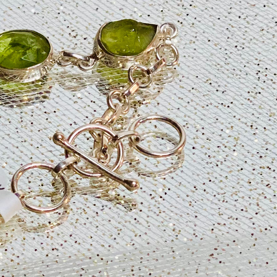 Radiant Harmony: Faceted & Raw Peridot Bracelet in Sterling Silver