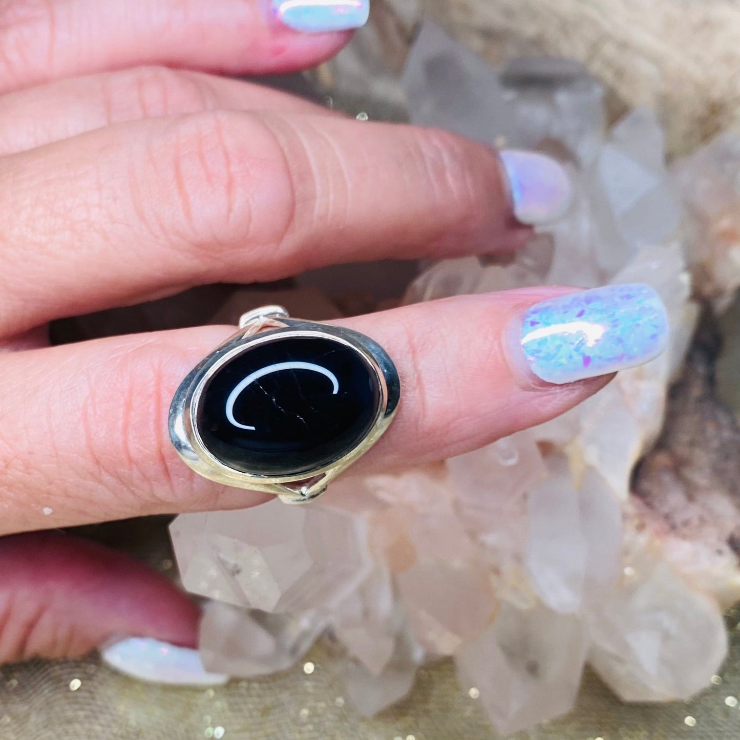 blkonyxovalringonhand-crystalsbytheseallc