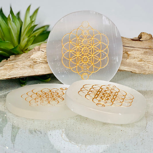 Amplify and Purify Energies with our Chakra Flower of Life Gold Engraved Selenite Charging Plates