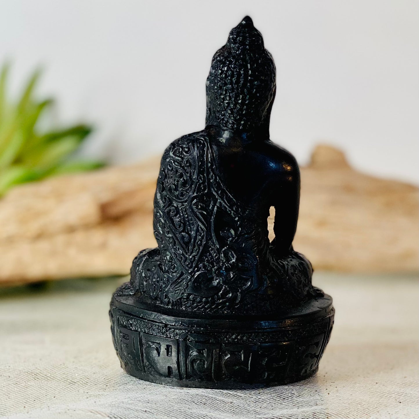 Sacred Serenity: Black Buddha Statue for Your Altar