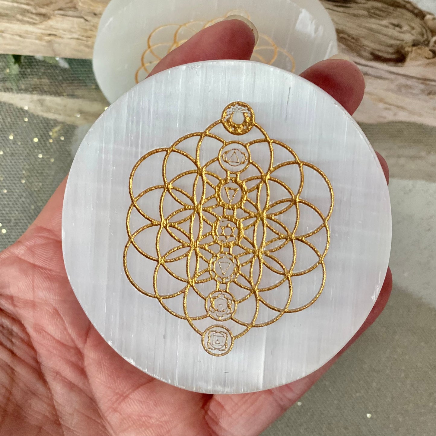 Amplify and Purify Energies with our Chakra Flower of Life Gold Engraved Selenite Charging Plates