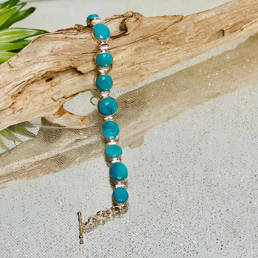 Turquoise Elegance: Sterling Silver Bracelet with 9 Cabochon Stones - Adjustable Length 7 to 8 1/2 inches