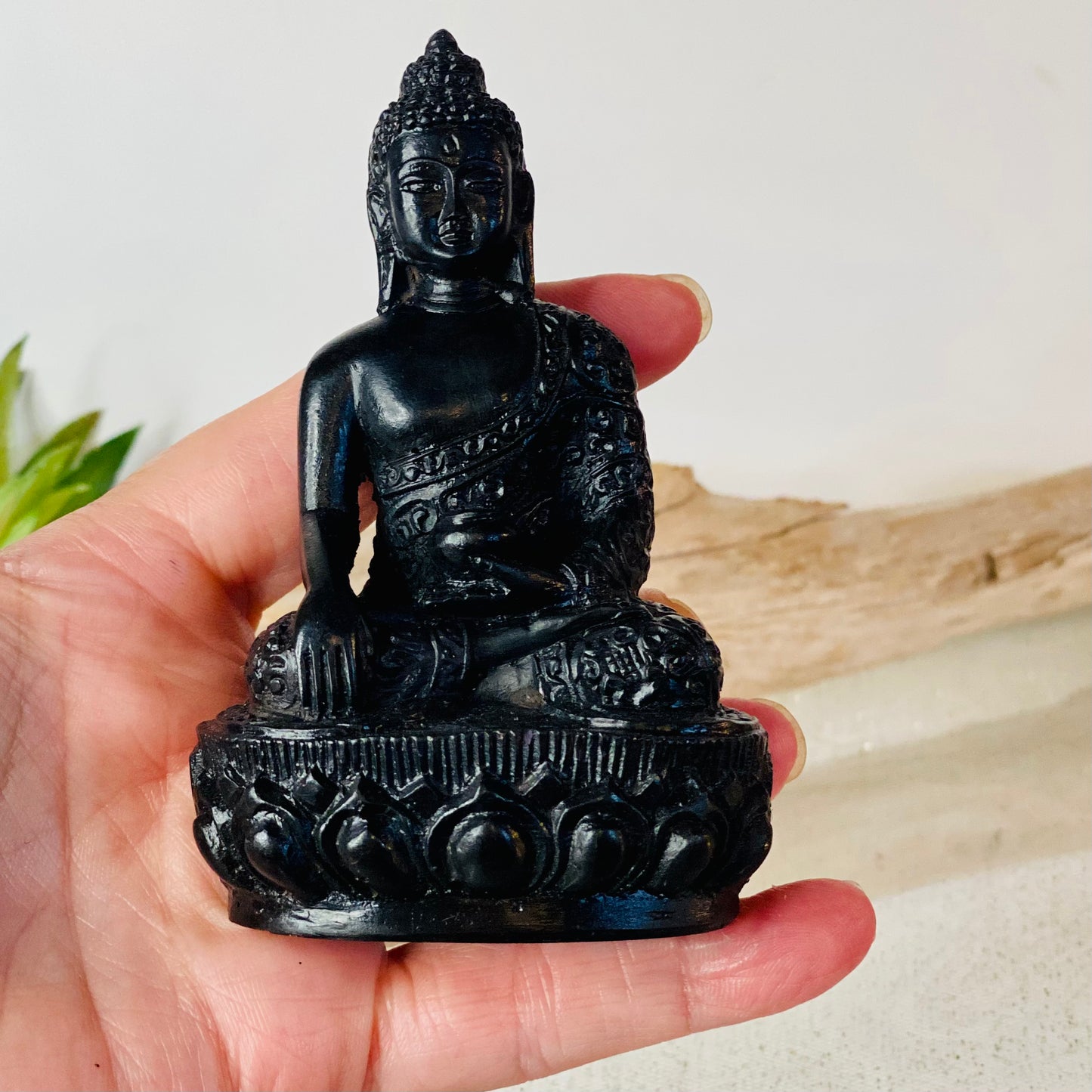 Sacred Serenity: Black Buddha Statue for Your Altar