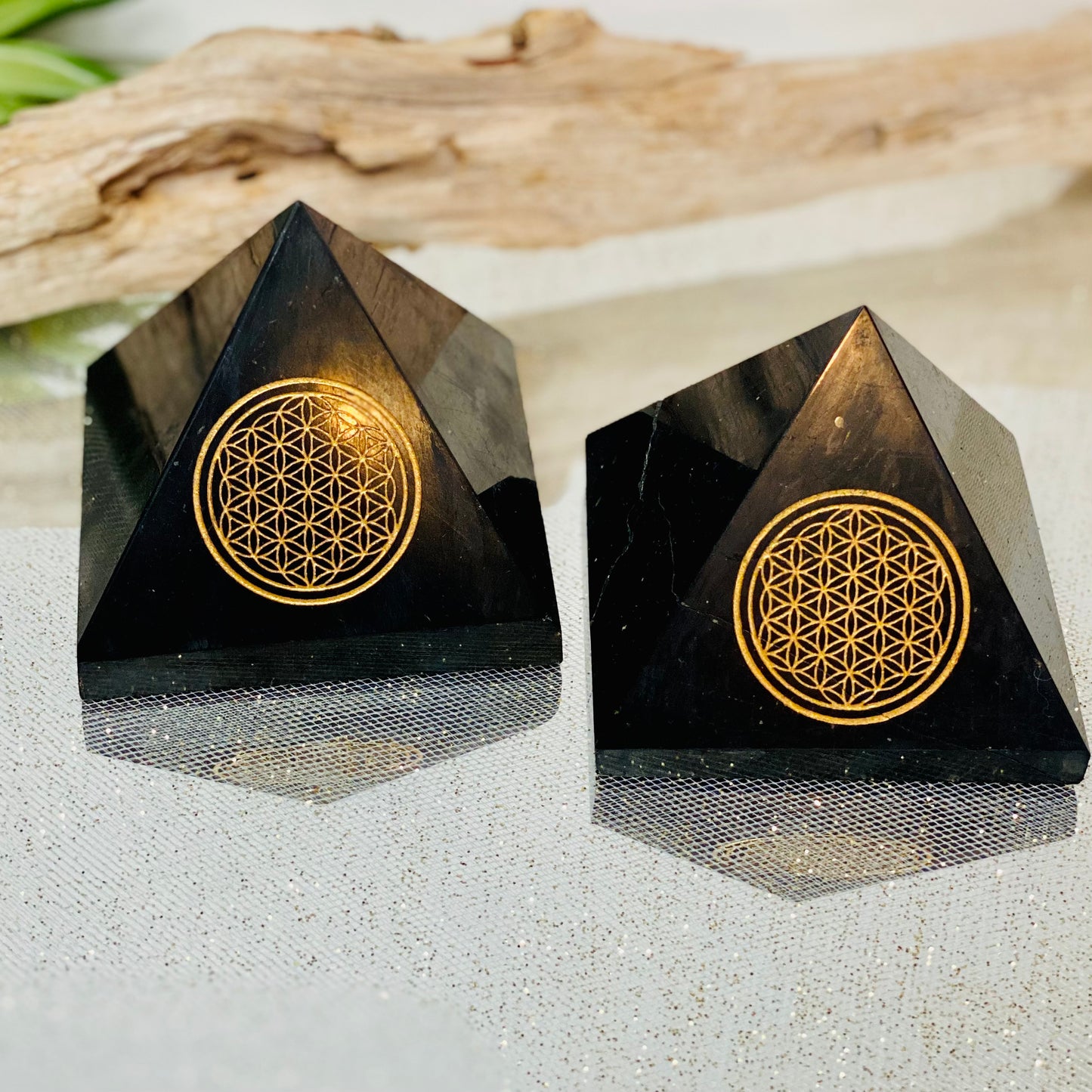 Harmonizing Energies: Shungite Pyramid with Gold Flower of Life Engraving