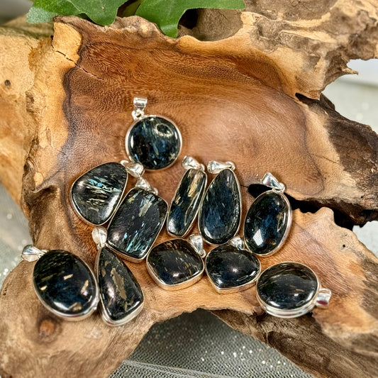 Channel the Earth's Energy with our Nuummite Pendant in Sterling Silver