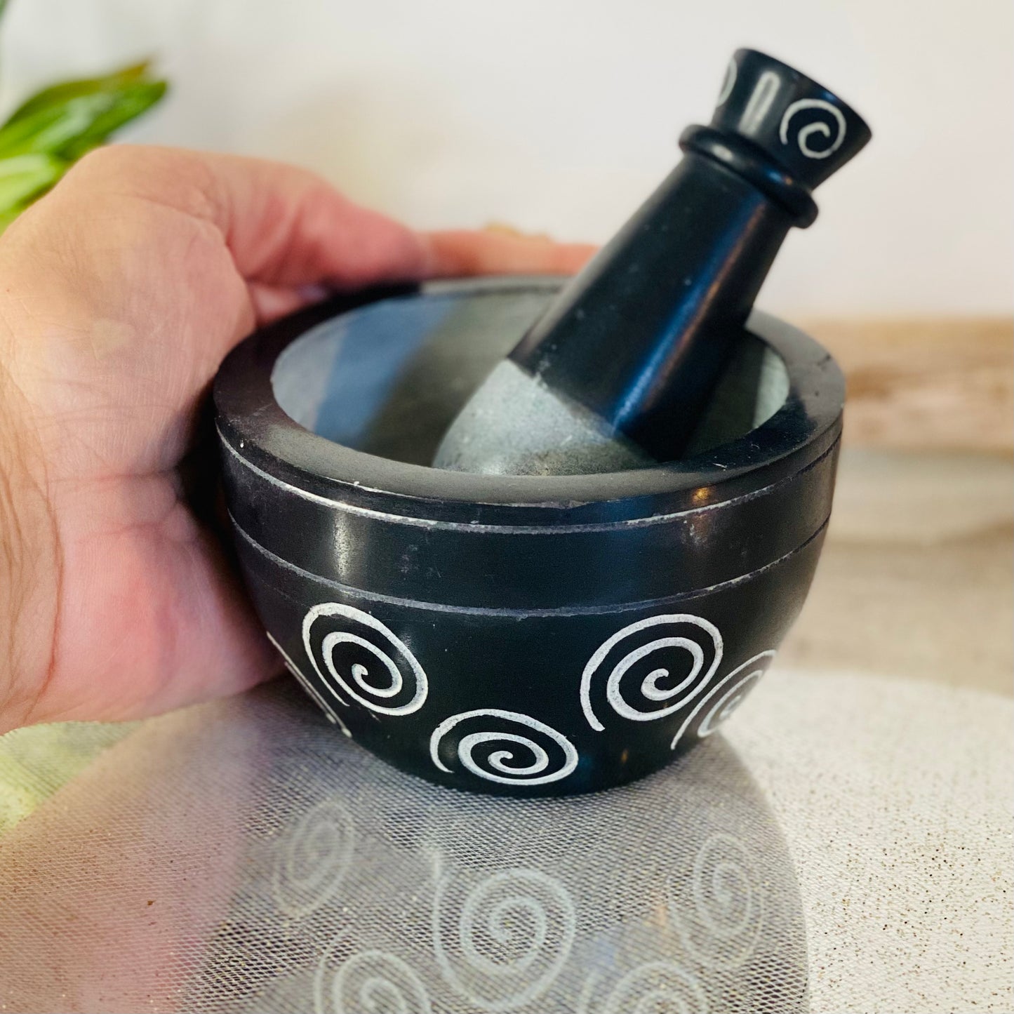 Elegance in Grinding: Jet Black Stone Mortar and Pestle with Engraved Spiral Design