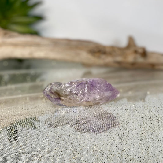 Rare Amethyst Crystal with Hydro Bubble Inclusion: Nature's Enigmatic Beauty