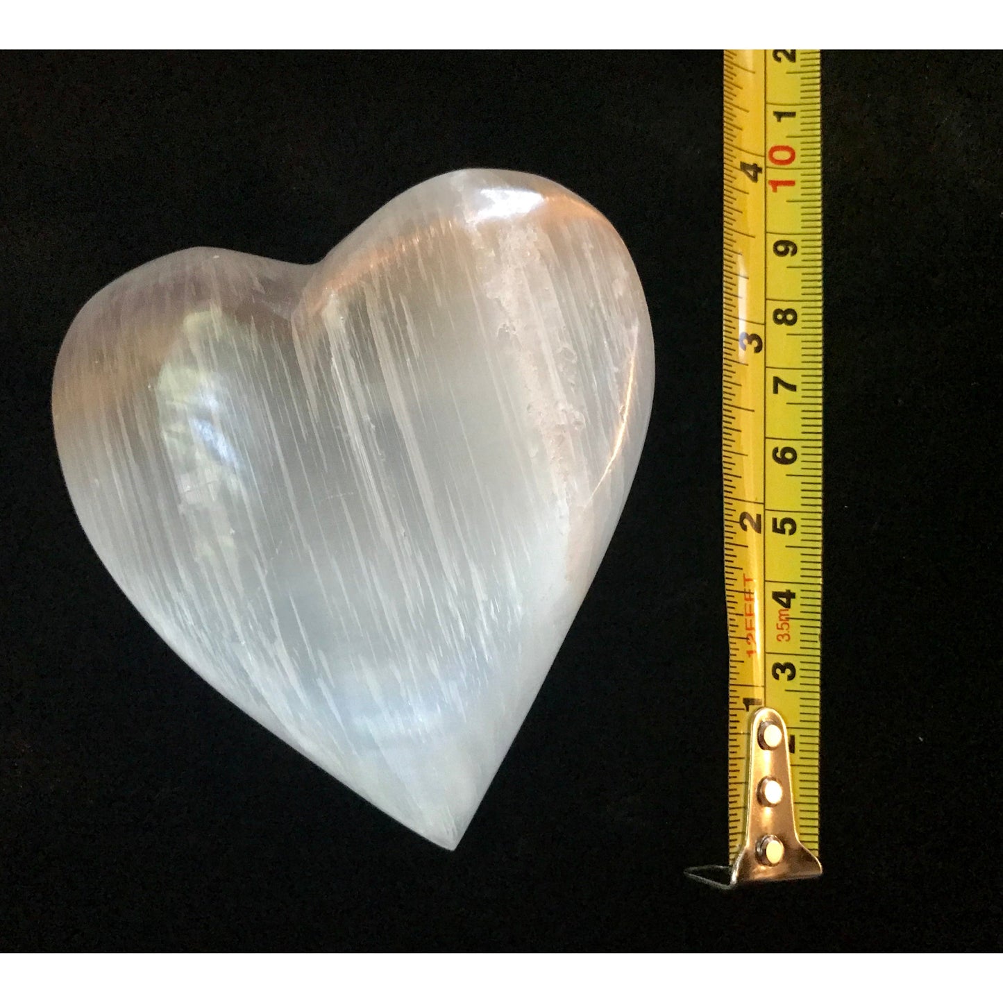 Heartfelt Elegance: Discover the Beauty and Cleansing Power of Large Polished Selenite Carved Hearts